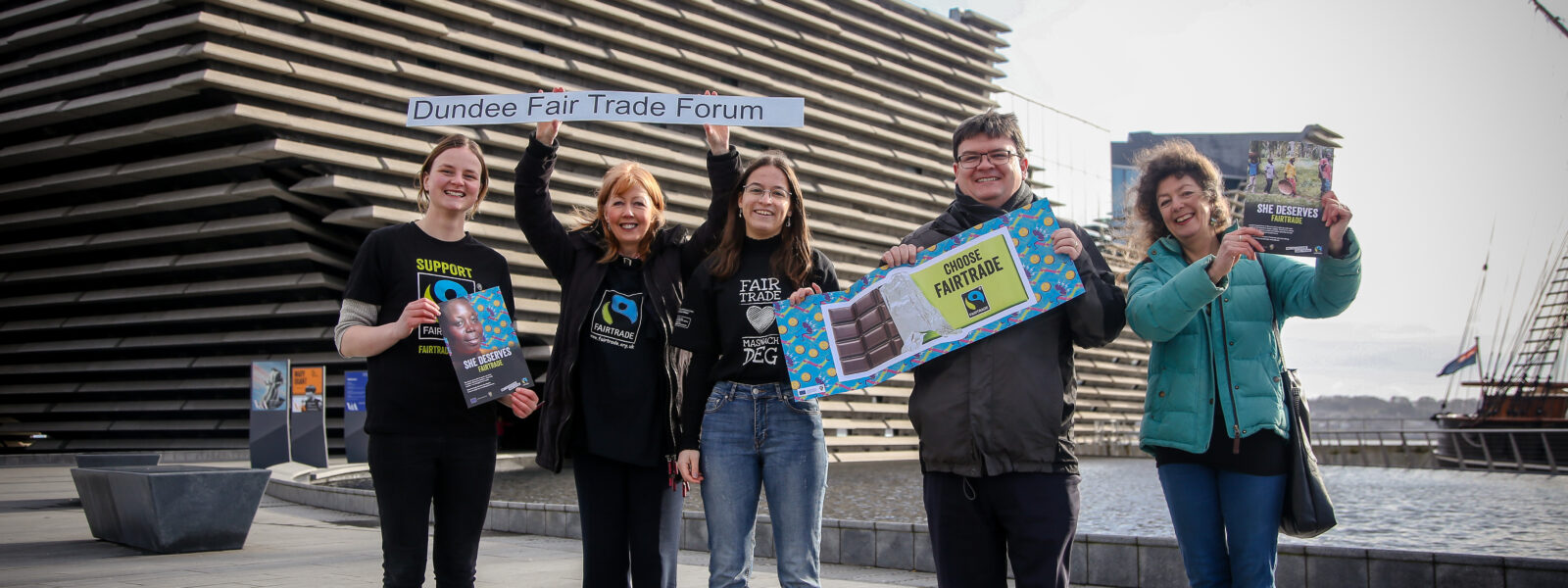 Dundee Fair Trade group holding Fair Trade banners.